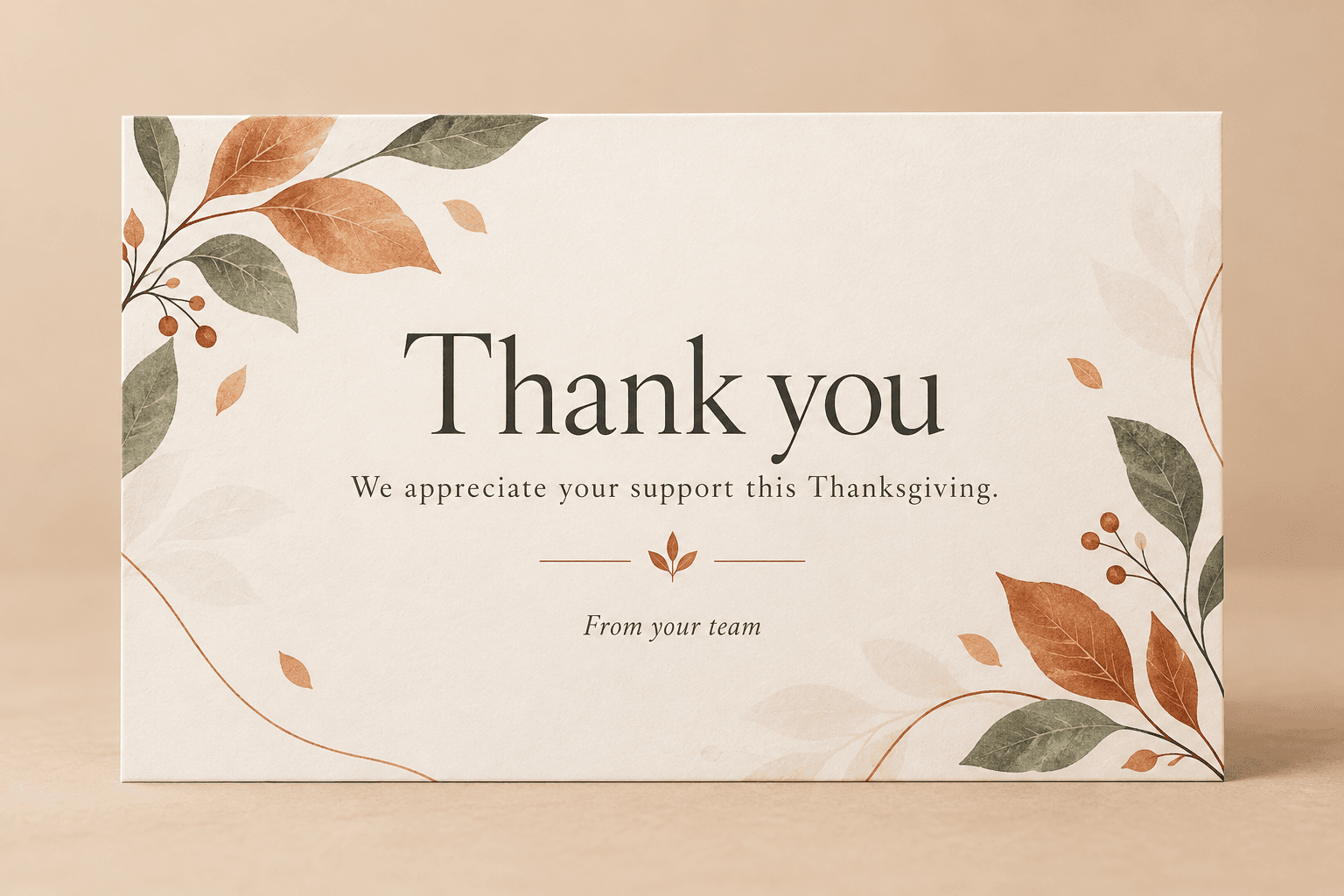 Fictional Thanksgiving customer appreciation card with autumn leaves, a thank-you message, and a small team signature